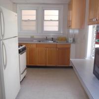 full kitchen with appliances and cabinets