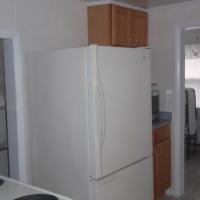 kitchen with full size refrigerator