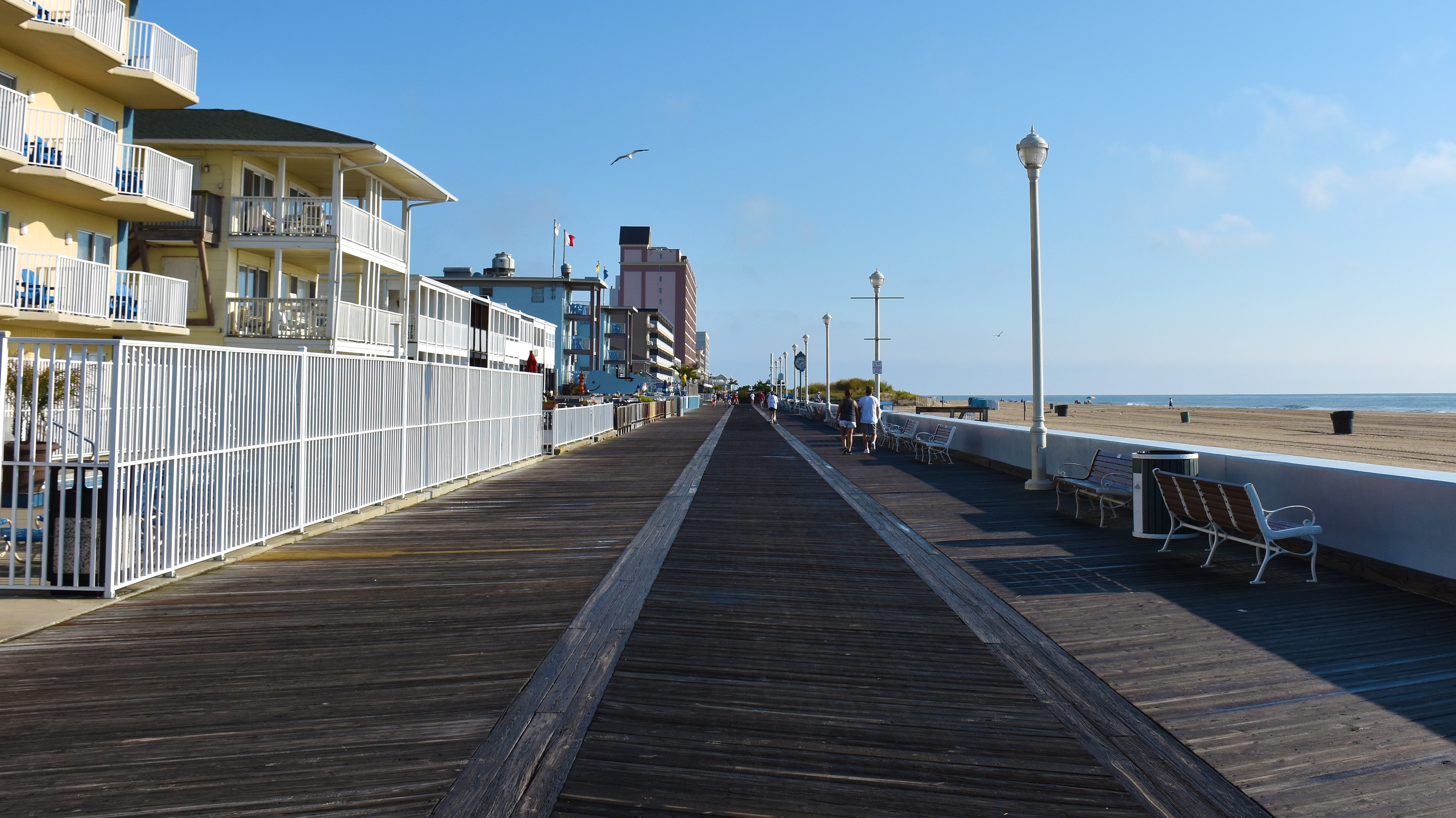 view of hotels and beach from boardwalk