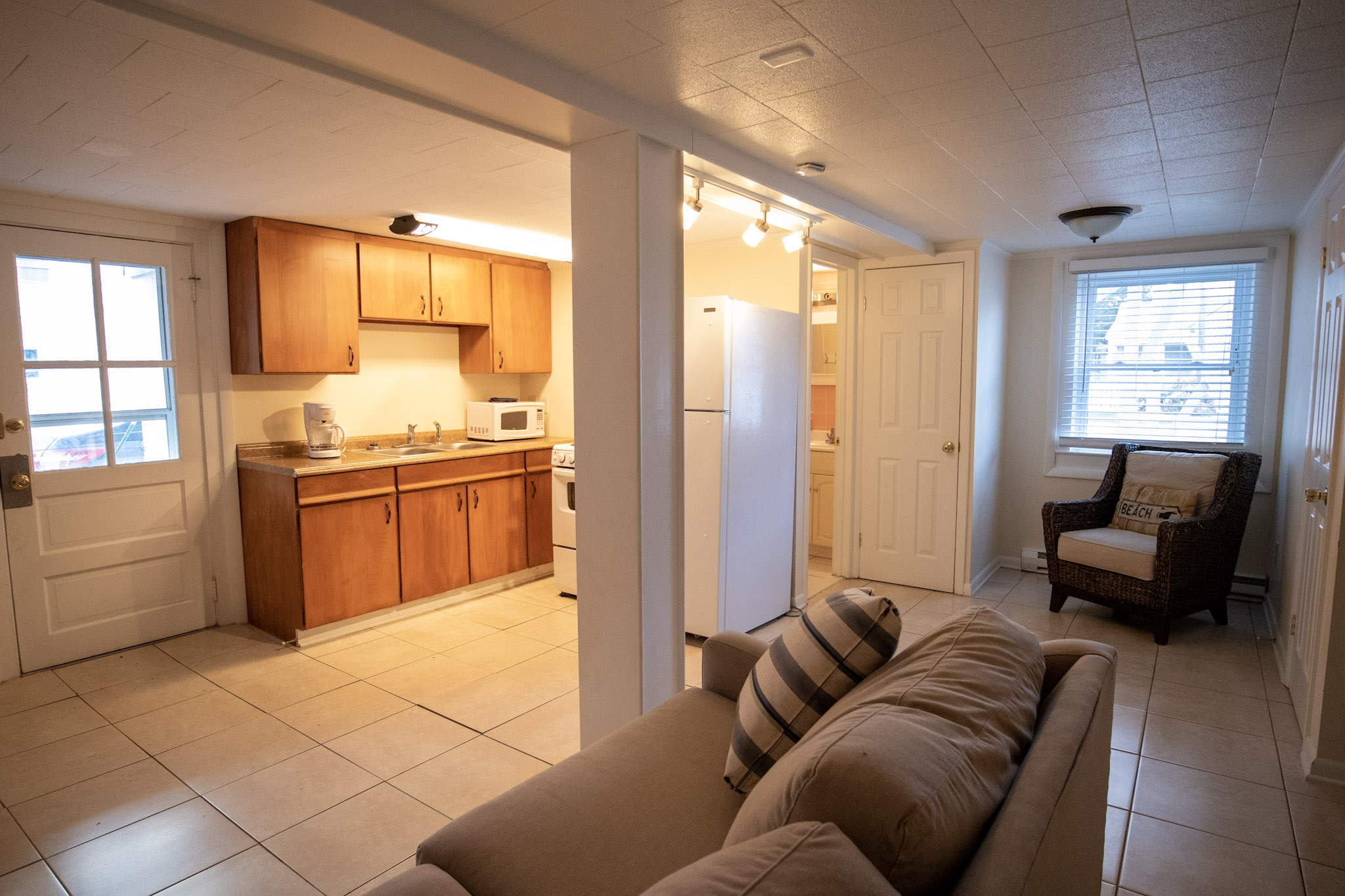Spacious living room and kitchen in the two bedroom apartment at the Majestic Hotel in Ocean City, Maryland